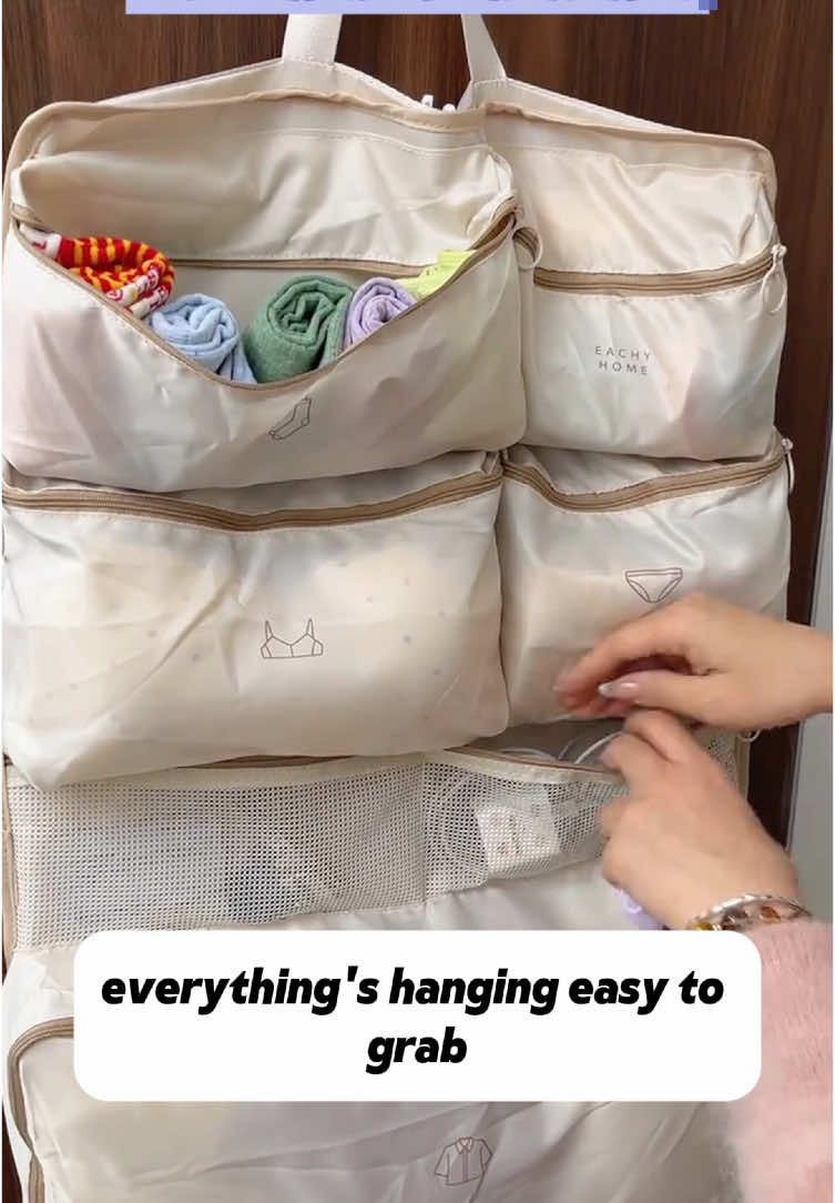 7-in-1 Hanging Organizer SAVED My Overpacking Anxiety! #packinghacks  #travelopganizer  #suitcaseorganization  #travelessentials  #packingtips  #carryononly  #spacehacks  #travelgear  #organizationtiktok  #packingcube