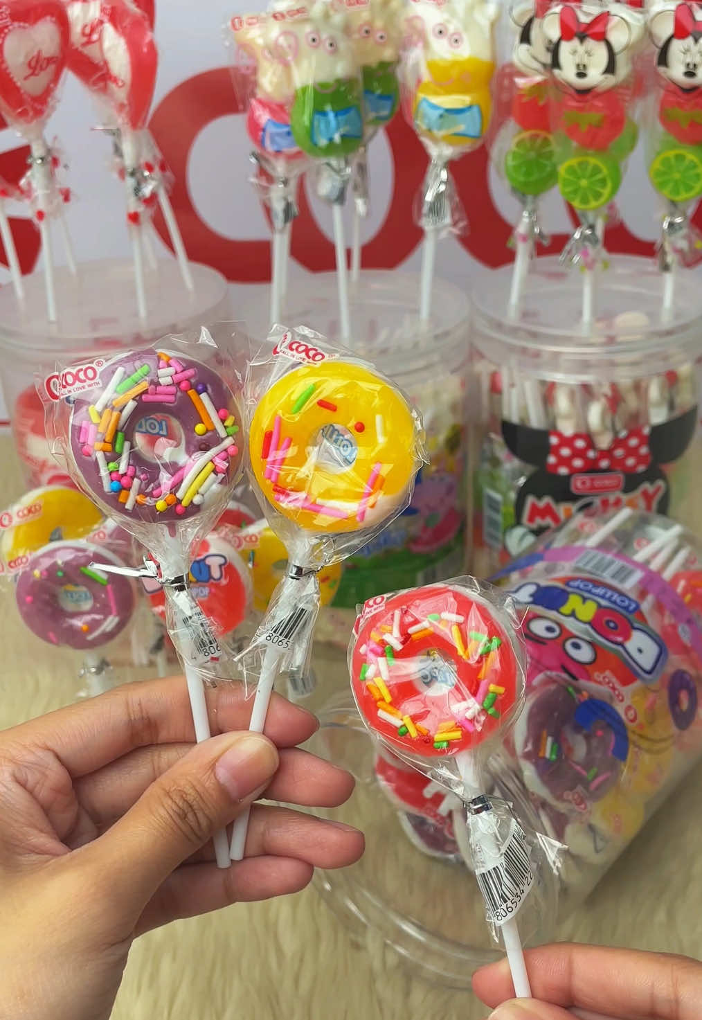 Enjoy our COCO Donut Lollipop with 30pcs/jar for only ₱105! Ideal for selling, giveaways & lootbags 😍  #lollipop #lollipopcandy #candy #donutcandy #donutlollipop #panindaideas #lootbags #cocofood #sweets #lollipops 