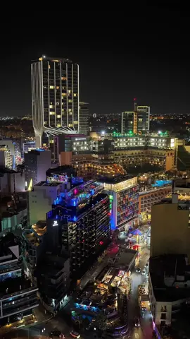 🌃 St. Julian’s by night — where the city lights meet the sea. From buzzing nightlife to shimmering reflections in Spinola Bay, this town transforms after dark.  Would you stroll the promenade or dive into the party scene? 👇✨🌊 #SkyViewMalta #VisitMalta #StJulians #MaltaByNight