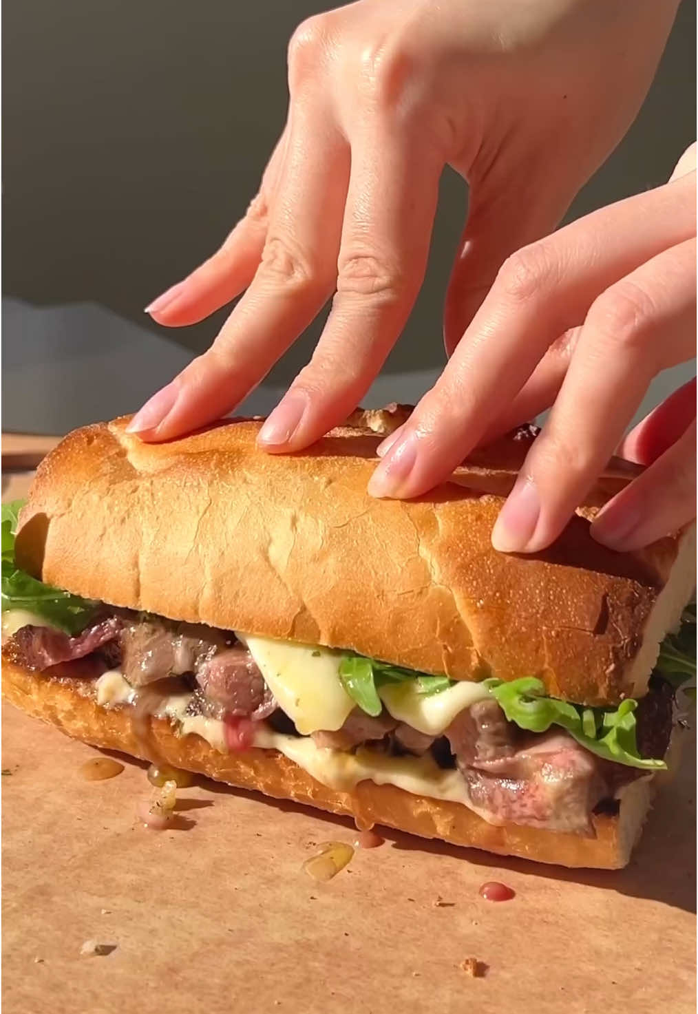 Forgot this was the whole point - the juiciest Chimichurri steak sandwich with mustard aioli 🥪 📍 recipe in my bio or visit butterhand.com #steaksandwich #steak #sandwich #sando #chimichurri #mustard #aioli #bread #asmrfood