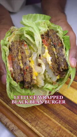 LETTUCE WRAPPED BLACK BEAN BURGER INGREDIENTS 4-6 iceberg lettuce leaves 1 Can of Black Beans (drained and rinsed) 1/3 chopped white onion 3 white or bella mushrooms 1/4 Cup of Chickpea Flour 3 tbs of Ketchup 2 tsp each: Salt Pepper Smoked Paprika Garlic Powder Onion Powder Vegan cheese of choice For Garlic Burger Sauce 1/3 cup vegan mayo 2 tbs ketchup 1 tbs sriracha 1 tbs mustard 1 grated garlic clove 2 tsp dried dill INSTRUCTIONS Add your peppers, onions and mushrooms to a food processor. Pulse until all is roughly chopped and around the same size. Sauté this mixture in a pan over medium heat until most of the moisture has cooked out (optionally sprinkle salt to draw out more water). Remove from pan and set aside. Then in a large bowl add the black beans, cooked veggies, chickpea flour and ketchup and mash to form the patty mix and it holds shape. Mix until all combined and mixture forms patty. Pan fry until crispy and cooked through. Dress with toppings of choice and enjoy! • • • • • • #veganrecipes #vegancooking #vegan #veganfoodshare #plantbased #holisticliving #healthyfood #Foodie #whatveganseat #wholefoodplantbased #blackvegan #plantbasedcooking #veganchef #vegancook #veganmeal #veggierecipes #wholefoodplantbased #lettucewrappedburger #blackbeanburger #flyingdutchman #veganbuger  #innoutburger