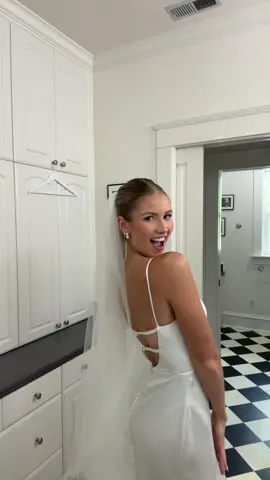 Dress and veil are from @a&bé bridal and I could not be more obsessed!!! I felt like an actual princess!!!! Also can we take a moment for the checkered bathroom floor 🤩🤩 my pajama set is from @Waverles and the claw clip is from @Emi Jay #wedding #weddingdress #weddingday #weddinginspo #2025bride 