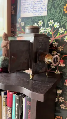 This magic lantern has quite a history, once belonging to filmmaker Kenneth Anger. Historically, a candle would be placed in the center, illuminating glass slides that slip through the front. The result? The earliest example of a projector. By the 1930’s these were largely obsolete but the principles behind them informed later technology. The magic lives on. 🕯️ #fyp #kennethanger #marjoriecameron 