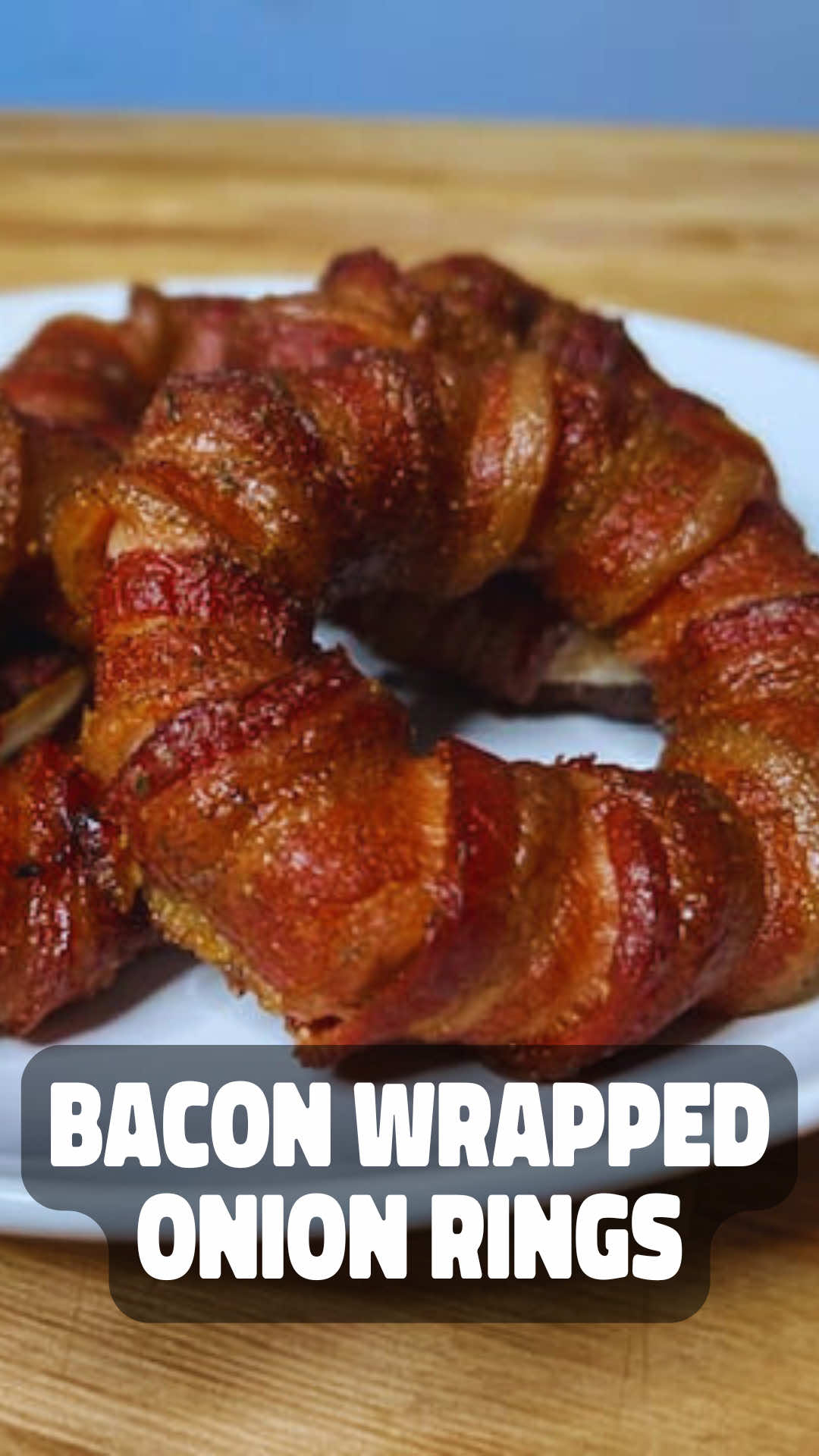 Throwback to when I made these Loaded Bacon Wrapped Onion Rings! Are you going to make these this summer? Let me know in the comments!🔥 #summerrecipes #bbq #danosseasoning #bacon #Foodie 