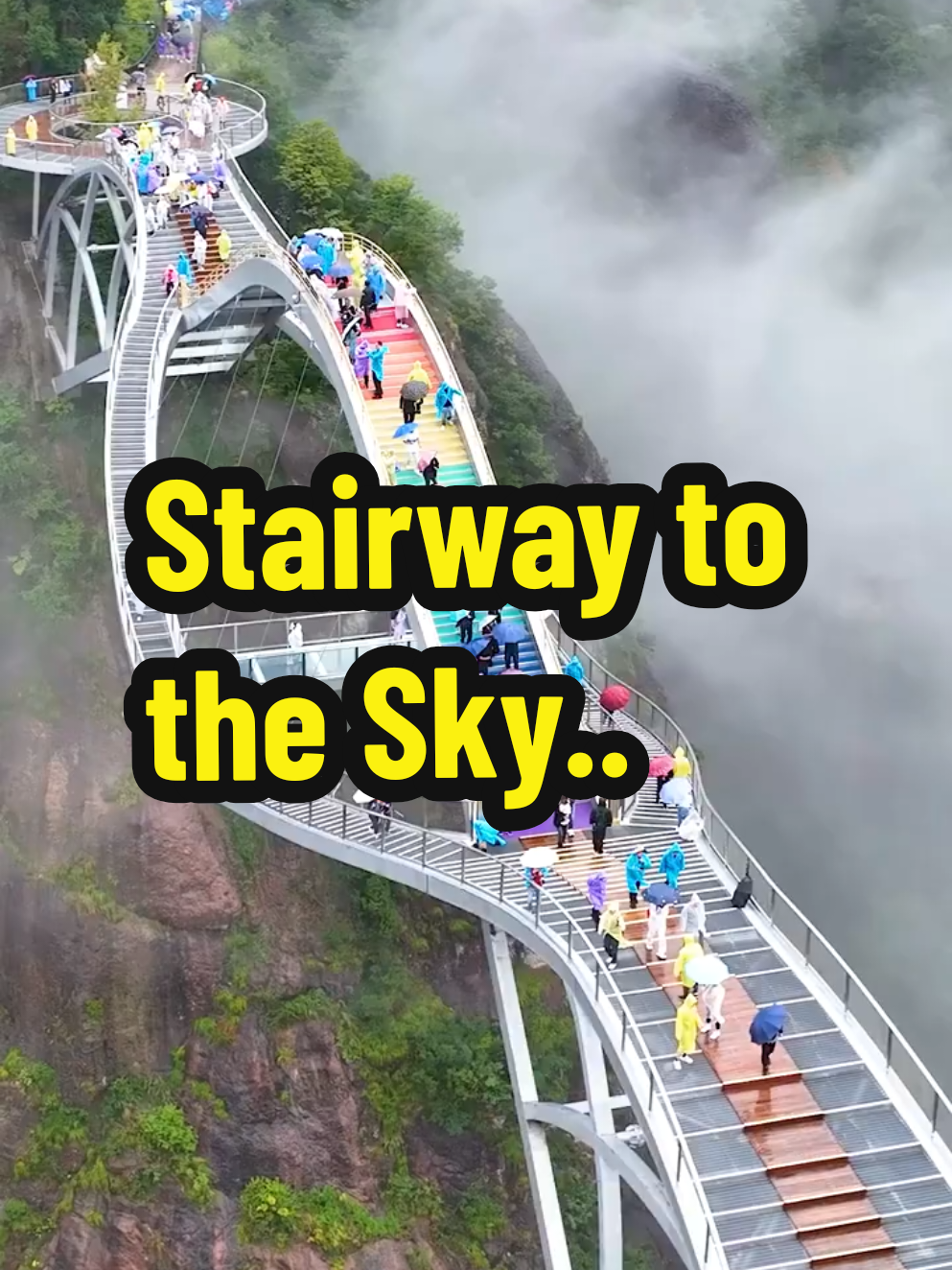 This breathtaking bridge, suspended 600 meters above the ground, offers visitors a magical walk through the clouds. Located in the Shenxianju Scenic Area in Taizhou, China, its unique rainbow-colored stairs and glass panels make it feel like you're floating in the sky. With misty mountains and lush green surroundings, this destination is perfect for thrill-seekers, nature lovers, and adventurers. Would you dare to cross it? #RainbowBridge #GlassBridgeAdventure #WalkingInTheSky #ChinaTravel #ScenicView #HeavenlyPath