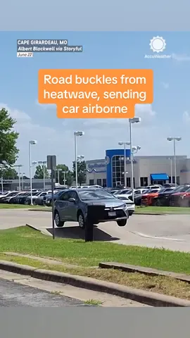 Video captured the moment a road buckled and sent a car flying as a heatwave impacted Missouri on Sunday. #heat #heatwave #missouri #caughtoncamera #road #travel #weather #accuweather 