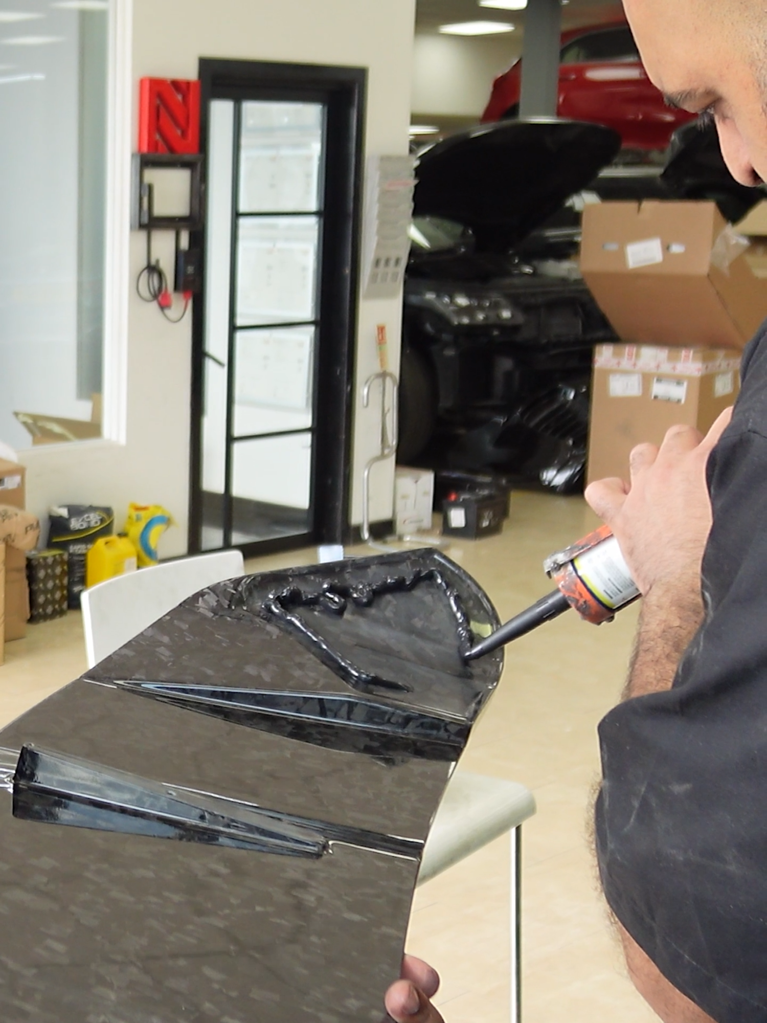 Just enough glue — never overfill #audirs6 #reels #nemesiscoachworks #supercars #mechanic #GarageVibes #luxurycars #carbonfiber