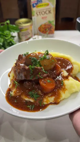 Warm up this winter with @Massel Stock & Bouillon 👏🏼 Recipe: serves 6  Prep time: 20 mins  Cook time: 6-8 hours  2 tbsp Oil  1kg Chuck Beef, cut into pieces  200g Bacon, diced  1 Large Brown Onion, diced  3 Carrots, roughly chopped  2 tbsp Tomato Paste  1 tbsp Garlic, minced  2 tbsp Plain Flour  750ml Red Wine (Shiraz or Pinot noir)  1 cup Boiling Water  1 tbsp Massel Foods Beef Style Stock Powder  200g Button Mushrooms, whole  Approx 10 French Shallot onions, whole  3 Bay Leaves, dried or fresh  4 sprigs Fresh Thyme  Fresh parsley to garnish  Serve with Mashed Potatoes, rice or crusty bread!  METHOD  1. Heat oil in hot pan and add the beef pieces. Once the meat is nicely browned, transfer to a bowl.  2. Add Bacon into the pan, cook for 2 minutes and then add the onions and carrots. 3. Once onions are slightly softened, add tomato paste and garlic. Cook for a further 2 minutes.  4.Stir in flour and combine, add in red wine and allow to come to a simmer.  5. Transfer beef and the red wine sauce into your slow cooker.  6. Combine Massel Foods Beef Style Stock powder with hot water and add into slow cooker along with the button mushrooms and shallot onions. Add the thyme and bay leaves and mix well.  7. Cook on LOW for 7-8 hours or on HIGH for 6-7 hours. You want to cook until the beef is soft and tender.  8.Top with fresh chopped parsley and serve with mashed potatoes, if desired. #Masseltastesbetter #Food #Recipe #ad #stew #easydinner #recipesforyou 