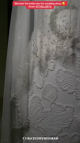 The Bride’s Reaction the Moment She Saw Her Wedding Dress 🥹✨ There’s nothing quite like the moment a bride lays eyes on her wedding dress for the very first time the dress she’s dreamed about, now brought to life in the most magical way. This stunning creation by @thillorys isn’t just a gown it’s a story of intentional design, expert craftsmanship, and love stitched into every detail. #thillorys #thillorysbride #fashiondesignerinlagos #nikkahbride #nikkahceremony #ruthiewillie  Wedding gown @THILLORYS  Makeup artist @beauty_by_zeeh  Photographer @biyigboyega_  Bridal Robe @thillorys Sylist @auntybammy10  Videographer @omohorfilmz_  Content creator @curatedbyreemah_