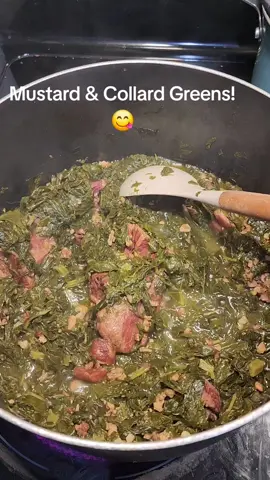 Mustard greens rich, peppery and packed with flavor. Simmered low and slow with garlic, onions, bacon crumbs and a touch of smoked neckbones for that deep Southern soul. #greensonstove #southerneats #southerncooking #soulfood #mustardgreens 