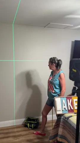 I for real just changed her life with this self-leveling laser level. This is how I hang pictures up on my wall by myself lol. Fanttik has done it again! #fanttik #laserlevel #picturehanging #laserleveller #hometools #picturehanginghack 