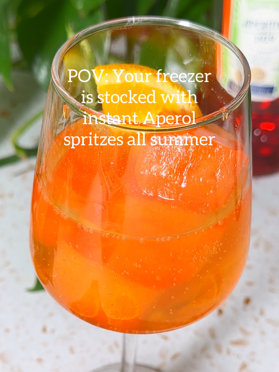Let this be the summer of instant Aperol spritzes! Just keep the cubes in your freezer until Aperol o'clock 🍊🥂 You'll Need: · 2 cups Aperol · 1 cup orange juice · 1 cup lemonade · 2 bottles Prosecco · To serve: orange slices Recipe link in the comments!
