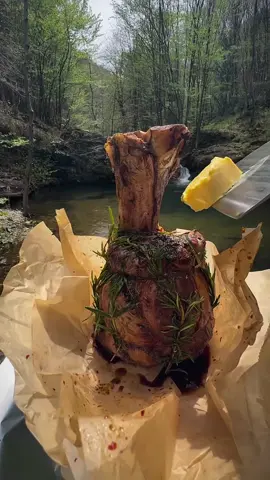 Grilled veal leg in mud in the middle of green mountains and forests 🥩🪵💦🐿 #cookingasmr #outdoorcooking #Recipe #leon #cookingnature #camping #foodtiktok #grilled #veal 