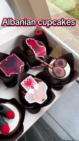 Albanian themed cupcakes 🇦🇱 chocolate cupcakes with morello cherry filling, milk chocolate frosting and handmade edible toppers: distinctive Albanian eagle, map of Albania, traditional shoes and çiftelia traditional musical instrument.  #albania #albaniacake #chocolatecupcakes #edibletoppers #bakedwithlove💖 #caketok 