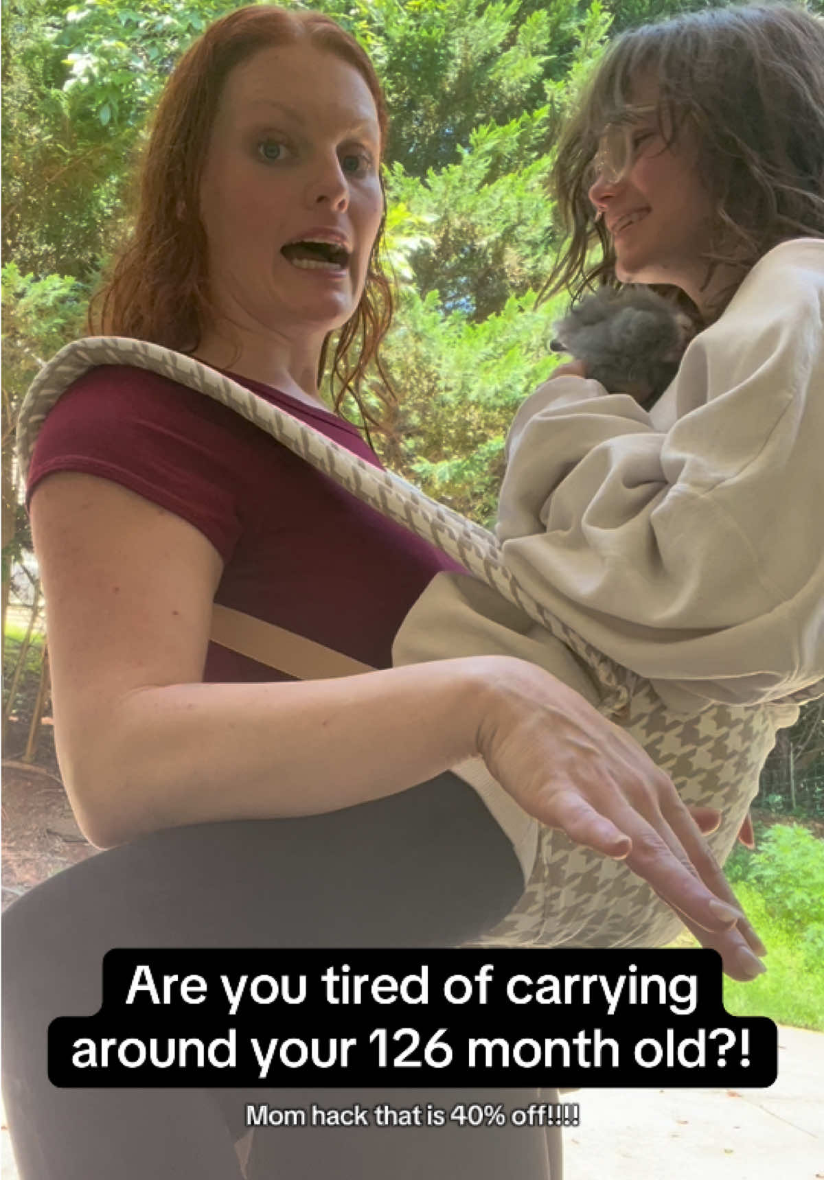 Yes, she’s TEN. Yes, it’s a joke. Yes, this carrier held her like a champ. Moms deserve support too—literally.  #MomHumor #TikTokMom #BabyCarrierHack #ParentingWin #TikTokShopSummerTurnUp #FunnyMomContent #HoundstoothStyle #TikTokShopFinds #babycarrier #ergonomicbabycarrier 