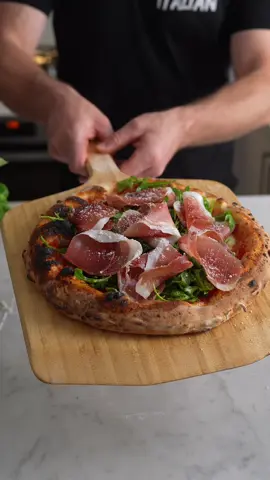 PROSCIUTTO PIZZA  Simple, fresh and delicious!!! Who’s in for this one?  ⬇️⬇️ - Pre bake:  simply add your pizza sauce and fior di latte  - Bake at 440 degrees Celsius for around 60 seconds or until you achieve your desired bake.  - Post bake: add generous amount of rocket followed by fresh prosciutto and a dusting of parmigiano!  📍Pro tip: cut your slices then add your prosciutto  Who wants a slice of this pizza?  Prosciutto by @Fabbris Smallgoods  Colavita olive oil by @Basile_Imports  Baked in the Ooni Koda 16 @Ooni Pizza Ovens  . . . . #pizza #prosciutto #parmigiano #pizzaparty #pizzalover #asmr #asmrfood #asmrvideo #Foodie #food #italy #italianpizza #ooni #oonipizza #pizzaparty #pizzadough #parmigiano #rocket #margherita #oliveoil #extravirginoliveoil 