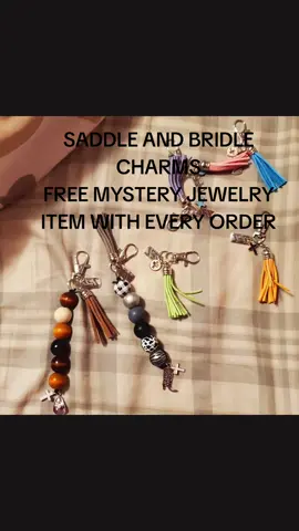 SADDLE AND BRIDLE CHARMS. SEVERAL STYLES AVAILABLE. Saddle charms have beads, a cross charm, and phrase charm, and colored tassel. The bridle charms have everything but the beads.  Saddle charms are $10 bridle charms are $5 Shipping is $3 All orders will come with a free mystery jewelry item. You can add on additional mystery items for $5. I do still have some black and white, brown and pastel beads available as well.#saddle #bridle #horse #equestrian 