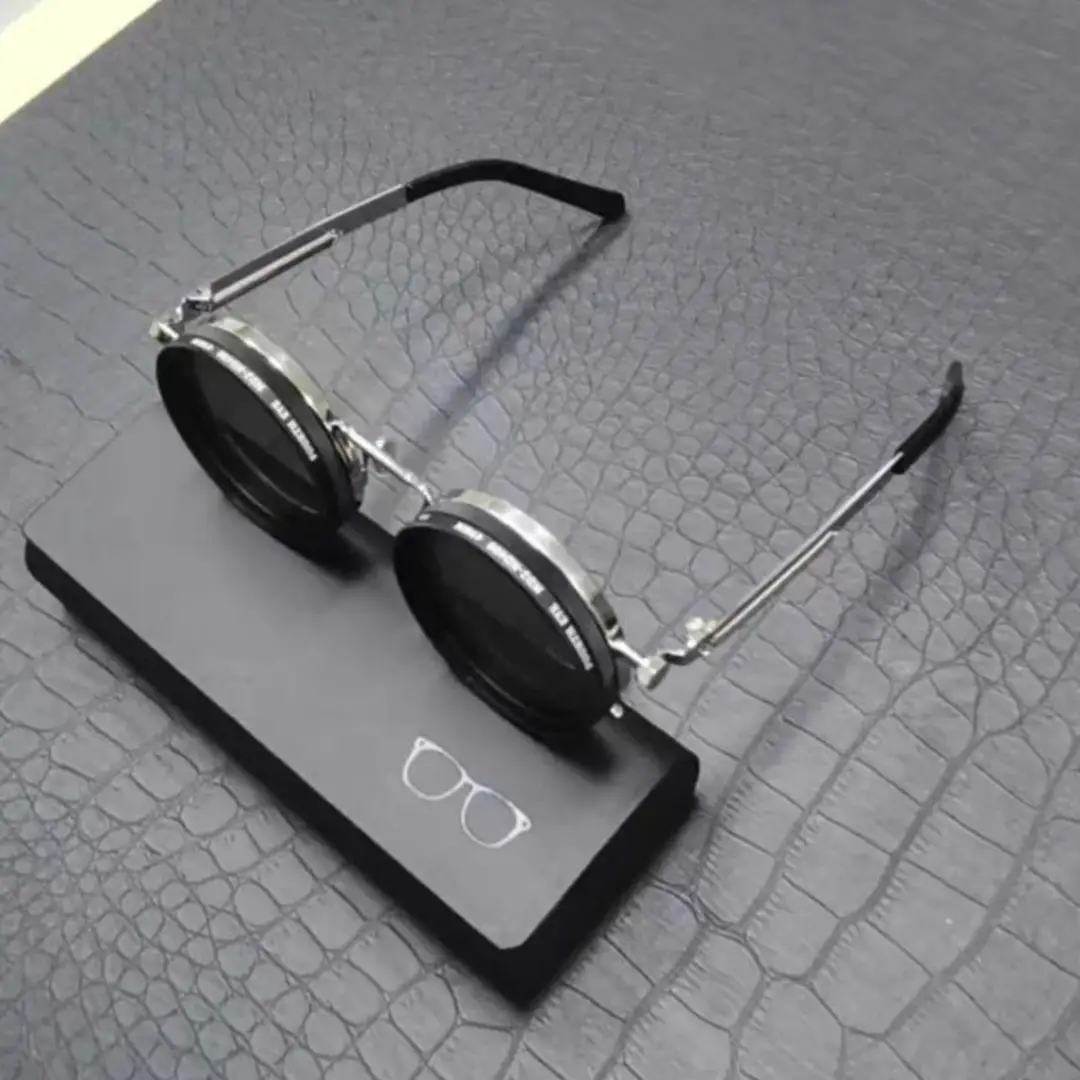 Check out our product: ShadeShift Eyewear 😊 At only: 56.66 EUR Click here: https://pawspulse.store/products/thick-nd-filter-glasses-9-speed-adjustable-sunglasses-rounded-polarized-glasses-handmade-unisex-punk-vintage-eyewear-with-bag