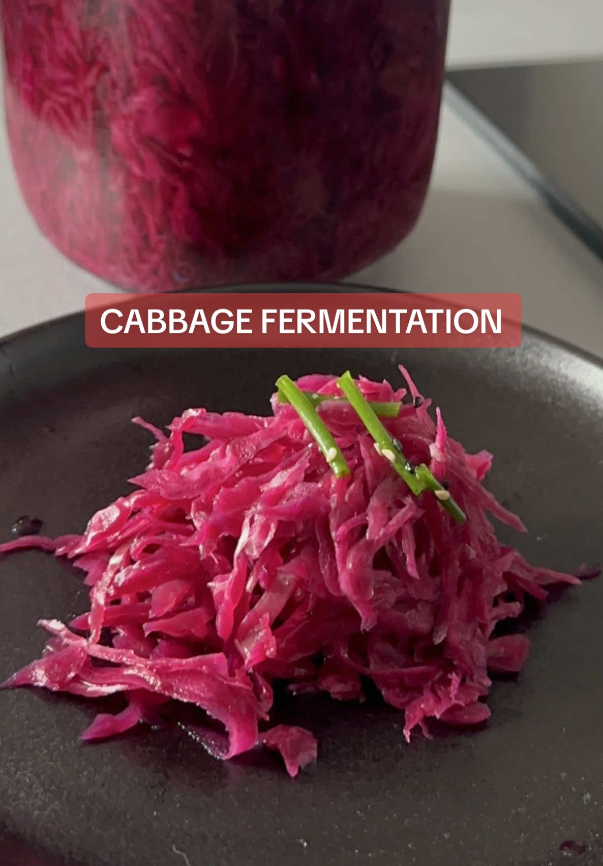 SAUERKRAUT  🥬 CABBAGE FERMENTATION Simple, crunchy, and full of natural probiotics There is a few different ways to ferment cabbage.  I like the easy, traditional way my Russian born grandma toot me. It is simple take only 4 to 5 days and always crunchy and delicious.   I don’t add any herbs or spices - I like to keep it plain so I can mix it easily with other dishes I attached two more videos for you 👇🏼 to understand process better @Holistic Style 👈🏼 FERMENTATION  @Holistic Style 👈🏼 POKING  INGREDIENTS & NUTRITION TIPS  • 1 firm purple cabbage – rich in fiber, vitamin C, and anthocyanins • 4 cups water (filtered) - for clean brine • ip to 1.5 tbsp sea salt - helps draw out moisture and supports fermentation How I Make it:  1  Choose a firm, hard cabbage to help retain a crisp texture after fermentation. 2  Shred or slice the cabbage thinly. 3  Pack the cabbage tightly into a clean glass jar. Press it down firmly with your hand or a wooden tool, this helps remove air pockets and allows the cabbage to settle evenly. 4  Pour the salt water (brine) into the jar until the cabbage is fully covered. 5  Place a clean weight on top (like a small jar or fermentation stone) to keep the cabbage under liquid, preventing exposure to air and spoilage.  7  Poke the cabbage with a clean stick or chopstick twice a day to release bubbles for proper fermentation This keeps everything submerged and prevents spoilage. Notes On the second or third day, the cabbage starts to release gas. It might smell a bit strong or unpleasant but don’t worry, that’s just the natural fermentation process. 8 Let it ferment at room temperature for 3 to 5 days. You’ll know it’s ready when bubbling stoped and it smells pleasantly tangy. 9 Store the finished cabbage in the fridge with the lid closed. BRINE FORMULA  • 4 cups (1 liter) non-chlorinated water • 1 or 1.5 tablespoon sea salt depending on your salt (non-iodized) How to Prepare the Brine 1 Dissolve the salt Use filtered or spring water (avoid tap water with chlorine). Gently warm the water if needed to help the salt dissolve, then let it cool completely before using. 2 Pour enough to cover the cabbage Once the cabbage is tightly packed into a clean jar, pour in the brine until the cabbage is fully submerged. Leave 1–2 inches of space at the top to allow for bubbling during fermentation. Sauerkraut is rich in natural probiotics that support gut health, boost immunity, and improve nutrient absorption for overall wellness and beauty #sauerkraut #cabbage #fermentation #liveprobiotics #guthealthy #Recipe #fermentedfood #realfood