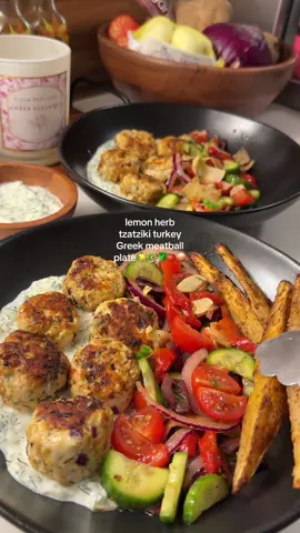 lemon herb turkey Greek meatball plate with homemade tzatziki🍋🥗🌿 recipe below: lemon herb turkey meatballs🌿 -1lb extra lean (99/1) ground turkey -1/4 cup chopped dill -1/2 cup panko -1/4 a red onion  -1 egg -3 minced garlic cloves -juice from 1/2 lemon (1 tbsp) -1/2 tbsp oregano -1 tsp paprika -1/4 tsp dried basil -salt & pepper -roll into 1 inch meatballs  -sear on medium heat for 2-3 mins on each side -bake at 400 for 8-10 mins (until internal temp reaches 165) -makes 4 servings (4oz each)  Greek salad🍅 -2 sliced mini cucumbers -3/4 cup chopped cherry tomatoes -1/4 a red onion -2 sliced artichoke hearts -1 roasted red pepper  -kalmata olives  -1 tbsp red wine vinegar -1 tbsp olive oil -1 tsp dill -1 tsp basil -1/4 tsp oregano -salt & pepper  -makes 4 servings  high protein homemade tzatziki🥒 -1/2 cup Chobani nonfat plain Greek yogurt -1 peeled & grated cucumber (water drained) -1/4 cup chopped dill -juice from 1/2 lemon -1 tbsp red wine vinegar -3 grated garlic cloves -salt & pepper to taste  -makes 4 servings  baked potato wedges🥔 -slice one 300g russet potato into wedges -soak in ice water for 30 mins -pat dry & season with garlic salt, paprika, & pepper -drizzle with avocado oil -bake at 420 for 30 mins  -makes 2 servings Assemble: -Add 1 serving tzatziki, turkey meatballs, Greek salad, & potato wedges to a plate. Garnish with dill & serve🥗 Macros per serving: cals: 430 / protein: 36g / fiber: 6g / carbs: 49g / fat: 10g  #DinnerIdeas #healthyrecipes #fyp #EasyRecipe #highprotein #healthy #mealideas #cooking #Recipe #quickrecipes #foodtiktok #dinner #foryou #Summer #summervibes  #creatorsearchinsights 