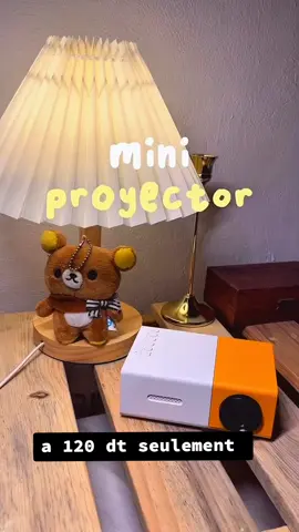 Mini portable projecteur 📱 (Resolution: 320 x 240)  (Brightness: Up to 900) (lumens, 15 ANSI Lumens)  (Contrast Ratio: 100:1)  (Lamp Life: Over 20,000 hours)  (Projection Size: 24″ to 60″)  (Projection Distance: 1 to 2 meters)  (Inputs: HDMI, USB2.0, MicroSD, Aux IN, AV IN)  (Compatibility: Chromecast and other media players)  (Speaker: 1W stereo speaker)  (Remote Control: Included)  تخمم بش تشري تلفزة تحطها في بيتك بش تنجم تتفرج في فيلم و أنتي مرتاح في فرشك؟ جبتلك الحل و بأرخس سوم و وين  تمشي تنجم تهزو معاك منغير قلق مالا فاش تستنا خليلنا كومنتار فيه (moi)  ونحنا نتصلوا بيك  #creatorsearchinsights #miniprojector #vente #tunisia🇹🇳 