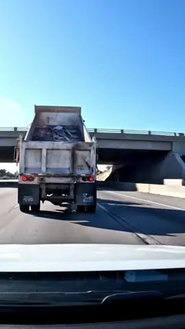 Dump truck hit the overpass with its raised bed. #TruckCrash #OverpassHit #Dashcam #CollapseCam