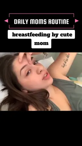 baby breastfeeding by cute mom