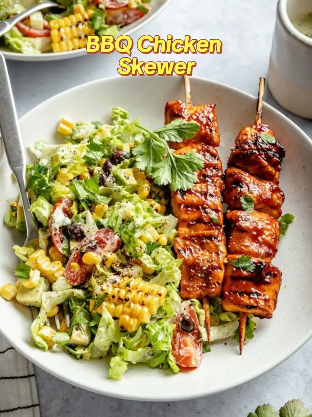 **Ingredients:** * 1 lb boneless, skinless chicken breasts, cut into 1-inch cubes * 1 tbsp olive oil * 1 tbsp BBQ sauce (low sodium preferred) * 1 bell pepper (any color), cut into 1-inch pieces * 1 red onion, cut into 1-inch pieces * 1 cup cherry tomatoes, halved * 1 cup cooked quinoa or couscous (optional, for added protein and fiber) **For the Dressing:** * 2 tbsp olive oil * 2 tbsp apple cider vinegar * 1 tbsp honey * 1 tsp Dijon mustard * Salt and pepper to taste **Instructions:** 1. **Prepare the chicken:** Marinate the chicken cubes in 1 tbsp olive oil and 1 tbsp BBQ sauce for at least 30 minutes (or longer, in the refrigerator). 2. **Assemble the skewers:** Thread the marinated chicken, bell pepper, and red onion onto skewers. If using wooden skewers, soak them in water for 30 minutes beforehand to prevent burning. 3. **Grill or bake:** Grill the skewers over medium heat for approximately 10-12 minutes, turning occasionally, until the chicken is fully cooked. Alternatively, bake them in a preheated oven at 375°F (190°C) for 15-20 minutes. 4. **Prepare the dressing:** Whisk together olive oil, apple cider vinegar, honey, Dijon mustard, salt, and pepper in a small bowl. 5. **Assemble the salad:** Place the cooked chicken skewers on a bed of lettuce (optional) or directly on a plate. Arrange the halved cherry tomatoes around the skewers. If using, add cooked quinoa or couscous. 6. **Dress and serve:** Drizzle the dressing over the salad and serve immediately. #ddscooking #creatorsearchinsight #fypシ #simplerecipe #atlantageorgia #fypp #homemade #EasyRecipe #whatsforlunch #whatsfordinner #chicken #salad #saladrecipe 