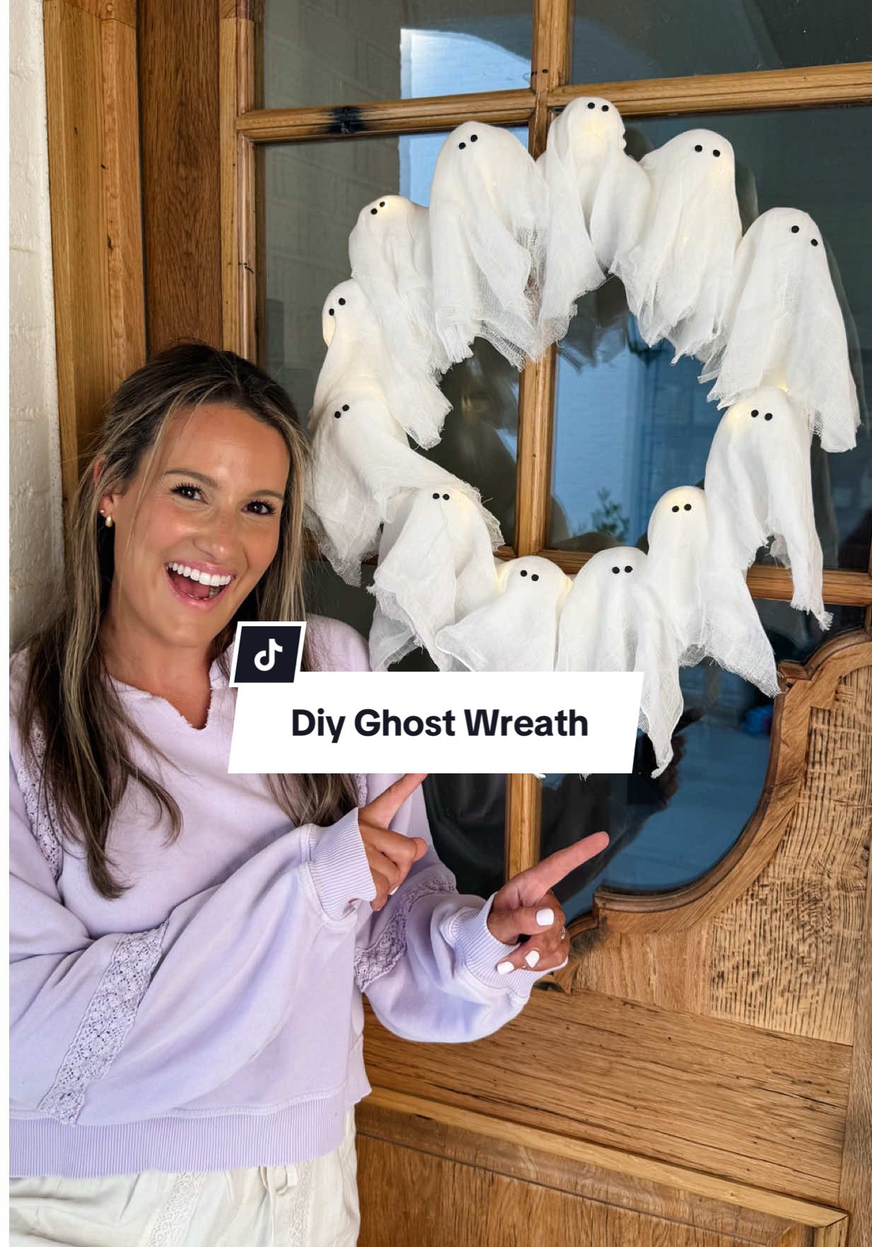 DIY Ghost Wreath! I love how this one turned out. It was easy to make and looks so cute on our door! #diyhomedecor #halloweendiy #halloween #halloweenideas #halloweendecor 