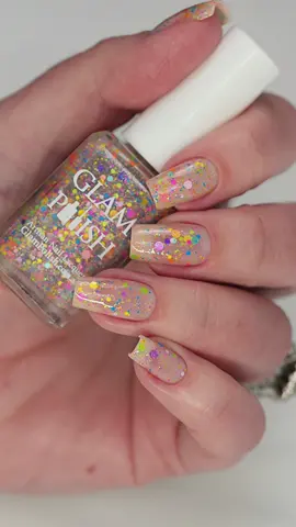 ✨ She’s A Maniac from the @glampolish 80’s Brights Collection is a dazzling neon, bright, and pastel glitter mix with scattered holographic flakies in a clear base. This polish is a sparkling celebration of all things bold and fun. 🌈 Perfect for anyone who loves a little extra sparkle and vibrant vibes. Ready to add some glitter magic to your nails? #GlamPolish #GlamPolish80sBrights #ShesAManiac #GlitterPolish #NeonNails #SummerNails #desrnails 