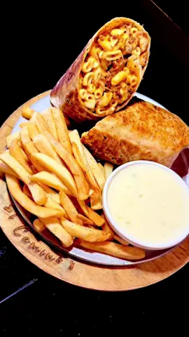 This Chicken Macaroni Burrito at El Caminos is mouthwatering 🤤🤤#southernnindianarestaraunt #elcaminos #food #fyp #restaurant #indiana #kentucky #chickenmacaroniburrito 
