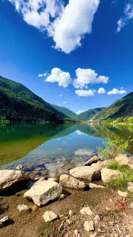 This water was still, the air didn’t move, and for once neither did I. #NatureTok   #PeacefulPlaces   #MountainLake   #EtherealNature   #StillnessScroll   #VisualPoetry   #NatureLoop   #TikTokNature   #ScenicSerenity   #fyp  #EmotionalScenery   #SoftEarthMoments   #SlowNature  