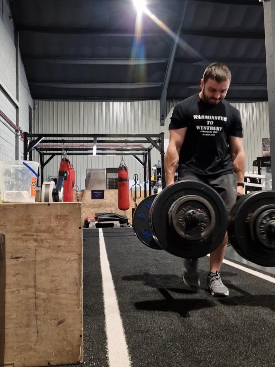 Farmers Carry PB 99KG each hand, 2 x 10 Metres. First time giving this a bash since the end of March when I had my competition. Quite frankly it's not a lift I particularly enjoy, and it kills my hands 😅   Nonetheless its a part of Strongman, I do like it's functionality, and it's certainly good for working your traps and grip strength. So here I am giving it a whirl again keeping it in the rotation.   Only a 2.5KG increase in each hand, but with zero training on it since then I'm definitely happy with that progression and clearly I've got some crossover from the rest of my training.   I've also checked the old video of my last PB run at 96.5KG and this one is faster and smoother even with the heavier weight, so sometimes there's progress in things other than the numbers which is still relevant.   To the non strongmen this exercise has some great functional crossovers, obviously this is very much how we often carry things as humans in day to day life. And specifically the grip strength, keeping your grip strong is a great way for us to age gracefully, as is the ability to move efficiently under load.   If you want help creating a training programme that keeps you fit and strong for life, or you want to know if Farmers carry is something you should be training. Or perhaps you just want someone to take the hassle out of deciding what you need to do in the gym then I can help you. Drop me a message for coaching enquiries and try Train Like Kane to see what you could gain 💪  #farmerscarry #farmerswalk #strongman #strongmantraining #strongmanmotivation #u90strongman #powerlifting #crossfit #functionaltraining #coaching #naturallifter #rawlifter #weightlifter #FitTok #GymTok #gripstrength #Fitness #fitnesstips #pb #fyp #strongfirst #bestrong #backworkout #GymLife #gymrat #gymmotivation #core #strengthtraining #bodybuilding #gym #grip 