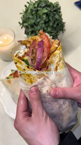 Chicken Shawarma with Garlic Sauce & Fries (recipe by @ayline.ea ) Ingredients: (4 wraps)  2 chicken breasts sliced into strips﻿ Olive oil Parsley  Tomato 1 Tbsp tomato paste Juice of 1 lemon Seasoning : (Paprika, turmeric, black pepper, salt, cumin, garlic powder) Garlic Sauce : 3 tbsp yogurt 2 tbsp mayonnaise Garlic (minced) Parsley Sumac Onions : 1 red onion, sliced 1 tsp sumac Parsley Juice of ½ lemon Extras:  Wrap Siracha sauce  Tomatoes  Cucumber Method:  In a bowl add the chicken strips, seasoning, olive oil, tomato paste & lemon juice. Set aside to marinate.  Cook the chicken-  add olive oil and cook the chicken until golden brown. For the garlic sauce- mix together the yoghurt, mayo, parsley and minced garlic.  Onion mix- mix together the onions, sumac and lemon.  Assemble the wrap- add the sauce, chicken, onion mix, siracha, cucumber, tomatoes and fries. Add some more garlic mayo sauce on top and fold together the wrap. Add back into a pan and toast till brown! Enjoy!!! 🥰.  #shawarma #wrap #EasyRecipes 