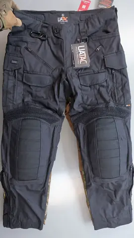 The UATAC Gen 5.6 Multicam Original Combat Pants with Knee Pads are designed specifically for active duty military personnel. The main emphasis in the development of assault pants with knee pads was placed on durability and comfort. The pants have been repeatedly updated and improved based on the experience of military use in extremely difficult conditions. The fabric consists of 65% cotton and 35% polyester, which makes it pleasant to the touch and resistant to tearing and damage. Ripstop weaving and German reinforced threads will prevent the pants from tearing even under heavy loads. Moisture-repellent Teflon coating protects against water and increases resistance to dirt. Equipped with two ventilation zones for improved thermoregulation. Insertable knee pads (included) are adjustable. Knee pads of the new generation are more convenient to use. Externally protected by reinforced CORDURA® 500d Brookwood® USA fabric. For convenient use, the pants are equipped with 11 pockets - two pockets in the front and two pockets in the back, 2 large cargo pockets (Left - equipped with two stabilizing elastics for fixing a water bottle or magazine and a carabiner; Right - equipped with two mesh compartments), two front pockets with adjustments the height of the knee pad inside, two pockets for small things in the lower part, a pocket for a knife on the right side. Fabric 65% cotton, 35% polyester. Ripstop weaving. Moisture repellent Teflon coating. Ventilation holes in the groin area and in the lower part of the pants. 2 carabiners on the front of the pants and in the left cargo pocket Insertable knee pads (included). If necessary, you can get knee pads. Externally protected by reinforced CORDURA® 500d Brookwood® USA fabric. Practical kneepad height adjuster and velcro tightening for correct positioning of the kneepad. Increased stretch panels with a stretch factor of 1.5 for better comfort during active use Two large cargo pockets on the hips Side zip cargo pockets for easy access while seated YKK zippers Two-layer seating area