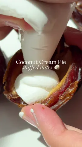 Coconut Cream Pie Stuffed Dates 🥥 RECIPE BELOW 👇🏻 Welcome to episode 8 of my Stuffed Dates Series ✨ I like to call this: lazy girl coconut cream pie 😍 it has all the flavors of the real thing—creamy, chewy, coconutty goodness—made in 5 minutes. No oven, no crust, no problem!  RECIPE: ✔️ 8 medjool dates ✔️ ½ cup coconut yogurt ✔️ ¼ cup crushed graham crackers ✔️ 15oz can coconut cream or milk, chilled overnight ✔️ ¼ cup toasted coconut flakes 1️⃣ Scoop out the thick top layer of cream from the chilled can of coconut milk and whip until fluffy (about 3–5 mins). 2️⃣ Spoon or pipe coconut yogurt into each pitted date. 3️⃣ Sprinkle with crushed grahams. 4️⃣ Top with whipped coconut cream and toasted coconut flakes. 5️⃣ Chill or enjoy right away! Save this for when you’re craving coconut cream pie but don’t actually want to make one 🤣💁🏼‍♀️ I know you’ll love it!! 🥥