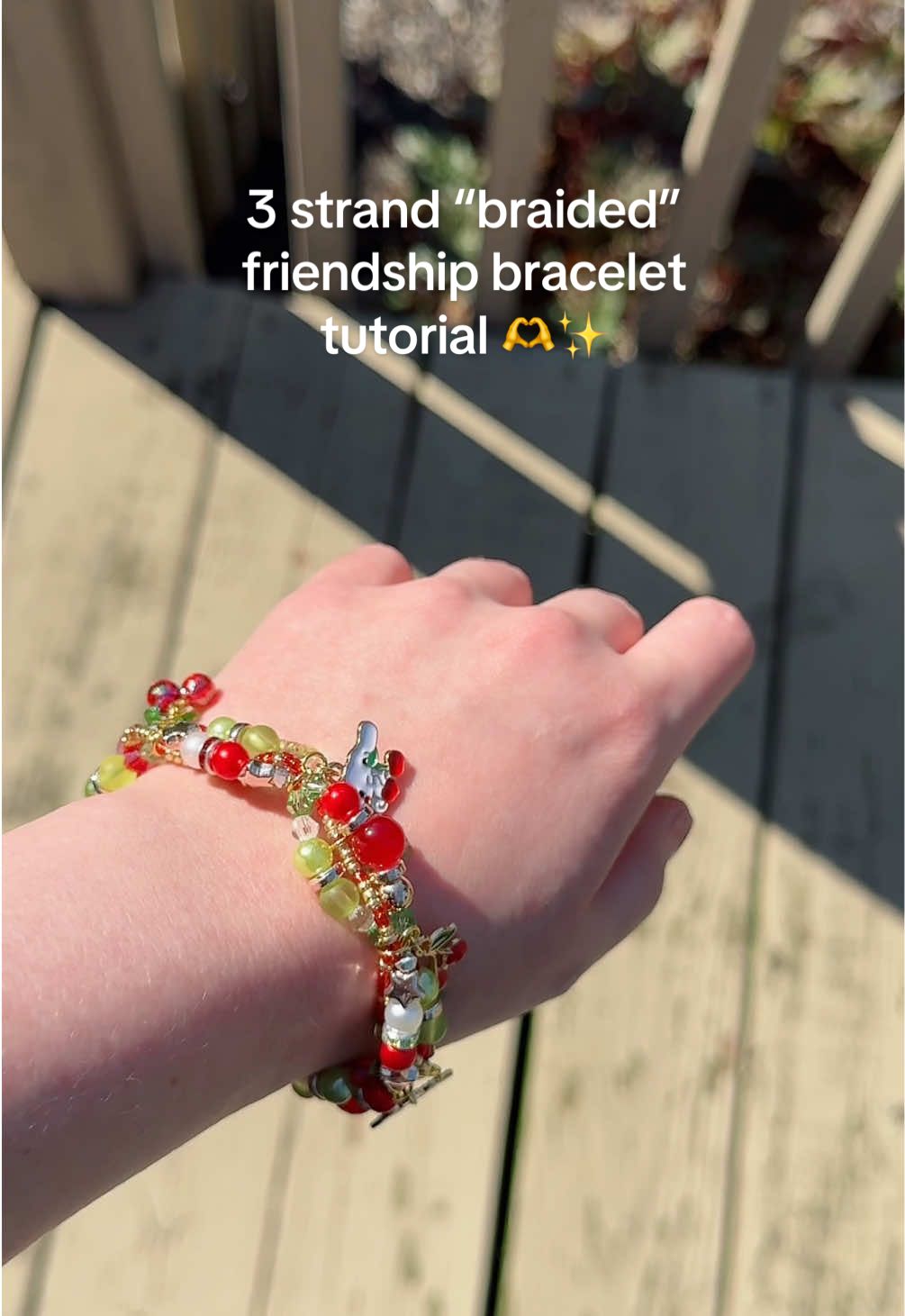 how to: 3 strand braided bracelet ✨🫶 feat. cinnamaroll 🐶 • #cinnamaroll #friendshipbracelet #bracelettutorial #tutorial #beadedbracelet #charmbracelet #swiftie 