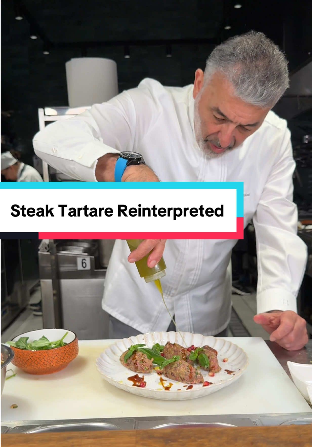 Would you it raw meat? 🤔Steak Tartare Reinterpreted in Mediterranean Style with Roasted Eggplant🥩 Ingredients: - Beef tenderloin 150g (cold) - Roasted eggplant 150g (cold) - Zest from 1/4 lemon - Zest from 1/4 lemon - Pomegranate concentrate 1 tnsp - Pomegranate seeds 1 1/2 tbsp - Parsley 1 tbsp finely chopped - Green onion 1/2 only the green part (finely sliced) - Thyme 6 sprigs (leaves finely chopped) - Olive oil 2 1/2 tbsp - Salt and pepper to taste - Basil a few leaves (garnish) Mince the meat with a knife. Peel the eggplant and seeds, then chop it. In a bowl, mix all the ingredients mentioned. Use the spoon technique in the video and place beef tartare on a plate. Sprinkle with a little pomegranate concentrate, add some basil leaves, a few pomegranate seeds and sprinkle with olive oil. Serve with toasted bread. Enjoy! 🇷🇴👇 Ingrediente: - Mușchi de vita 150g (rece) - Vânătă coapta 150g (rece) - Coaja de lămâie 1/4  - Coaja de  Portocală 1/4 - Concentrat rodie 1 lingură   - Boabe de rodie 1 1/2 lingură  - Pătrunjel 1 lingură tocat fin - Ceapă verde 1/2 doar partea verde (feliata fin) - Cimbru 6 fire ( doar frunzele tocate fin) - Ulei de măsline 2 1/2 linguri  - Sare si piper dupa gust - Busuioc cateva frunze (decor) Tocati carnea cu cutitul. Curatata vanata de coaja si seminte, apoi tocati-o. Intr-un bol amestecati toate ingredientele mentionate. Folositi tehnica cu lingurile din videoclip si asezati tartarul de vita pe farfurie. Stropiti cu putin concentrat de rodie, adaugati cate frunze de busuioc, cateva boabe de rodie si stropiti cu ulei de masline. Serviti cu paine toast. Pofta buna! #recipes_by_joseph_hadad  #creatorsearchinsights 
