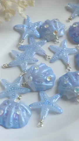 Ocean vibes🩵✨🐚🫧Made with love & shrink plastic  #ShrinkPlasticJewelry #OceanVibes #StarfishAccessories #SeashellJewelry #HandmadeWithLove #FairycoreJewelry #MermaidAesthetic #SummerJewelry #OceanInspired #HandmadeAccessories