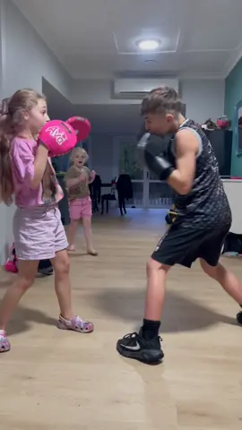 Coach Ava helping big bro level up 🥊💯 #boxing #boxingtraining  #kidsboxing #boxingdrills #fitnessmotivation #padwork #stronggirls #selfdefense #fyp  #foryou #viral #girlboxer #futurechamp 