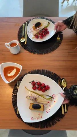 I LOVE THE CUISINES OF THE WORLD At home, I have already tried dozens of soup recipes from different countries: French onion soup, cioppino, Irish soda bread soup, bouillabaisse, gazpacho, Japanese kanto jiru soup, chowder... I really enjoy immersing myself in the culture of different countries through their culinary traditions 🥰 Today I made borscht, which I served with sturgeon, croutons, and black caviar thanks       It turned out very delicious! Do you know what borscht is? Have you tried it? 😊.  Ingredients: • Sturgeon • Rosemary • Butter For the sauce: • Olive oil • Onion • Garlic • Carrot • Beetroot • Potato • Canned tomatoes • Cabbage • Salt • Broth • Yogurt Additionally: • Cherry tomatoes on the vine • Green onions • Brioche • Butter • Microgreens • Black caviar Cooking Instructions: 1. Clean the sturgeon and prepare the pieces. 2. In olive oil, sauté the chopped onion, garlic, carrot, and beetroot. Add the canned tomatoes, diced potato, and cabbage. Season with salt and add the broth. Cook until done. 3. After cooking, transfer the vegetables to a blender and blend until creamy. 4. Roast the cherry tomatoes and green onions in the oven with olive oil. 5. Cut the brioche into slices and toast until golden brown in butter. 6. Sauté the sturgeon in olive oil with rosemary, then add butter. 7. Assemble the dish: on a plate, arrange the roasted cherry tomatoes (lightly char them with a torch), green onions, sturgeon, and brioche. Top the brioche with black caviar and garnish the sturgeon with microgreens, then pour over the sauce. Enjoy your meal! #byvelcheva #FoodArt #CulinaryDelight #DeliciousFood #Recipe   