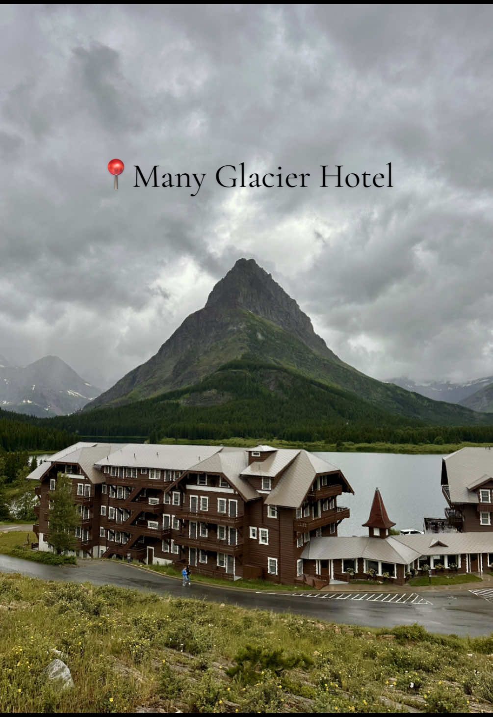 During my visit to Glacier National Park, I was fortunate enough to snag a night at the Many Glacier Hotel — Glacier National Park’s most iconic lodge, built in 1915 with dreamy Swiss chalet vibes. Nestled on Swiftcurrent Lake with jaw-dropping views of Grinnell Point, it’s steps from the park’s best and most famous hikes (Iceberg, Cracker, Grinnell) and full of historic charm. No TV, no distractions…just cozy mountain air, wildlife sightings, and adventure right outside your door. This isn’t just a stay…it’s a time machine into Glacier’s golden era. 🌲🛶  ➡️ From July - September 2025, you cannot access any of the Many Glacier area on a whim by personal vehicle due to construction. Timed entry does not apply to this portion of the park during these dates. Reservations must be made in advance to gain admittance to the road that takes you to the Many Glacier area.  ➡️ The only available reservations to gain access to this area are: a hotel booking (limited availability), boat tour reservation (sold out for weeks in advance), or a hiker shuttle ticket (must be obtained the night prior at 7 pm MST, and are currently selling out within seconds.)  ➡️ You will have to show proof of one of these three reservations at the Many Glacier entrance ranger station to gain access with your personal vehicle at ANY time of the day. There is a locked gate after hours that is only accessible by a unique code that hotel guests are sent a few hours prior to check in that is valid for the duration of their stay.  ➡️ The road to access Many Glacier is an all dirt road up to the last mile or two, filled with heavy dust and potholes and with absolutely zero cell service. Be prepared!  #glaciernationalpark #manyglacierhotel #nationalparks #solotravel #americalodges #hikinglife #montanamagic #travel #traveltok #manyglacier 