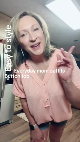 This ribbed shirt is a perfect everyday top. So many colors, cute design, soft #everydaymomoutfit #springandsummershirts #dealsforyourdays #affordablefashion #over50moms 