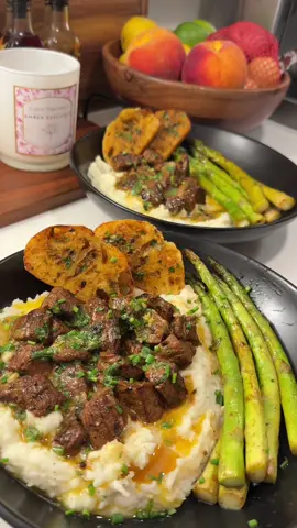 garlic & herb butter steak bites over mashed potatoes🥩🌿 recipe below❤️ garlic herb butter: -1/4 cup (1/2 a stick) softened butter -1/2 tbsp Dijon mustard -1/2 tbsp chives -1/2 tbsp parsley -2 tsp minced garlic  -1 tsp lemon juice -1/4 tsp cayenne pepper, paprika, red pepper flakes, salt & pepper  -makes 4 servings  garlic herb butter steak bites: -trim 1lb sirloin steak tips into bites ~1inch  -season with Worcestershire sauce, salt, pepper, & buttery steakhouse seasoning  -sear in olive oil on medium/high heat (cast iron is best) -flip after 2 mins and sear  -reduce heat and stir in 2 tbsp garlic herb butter in pan  -remove steak and add asparagus (or vegetable of choice) in pan and sauté until fork tender (about 8 mins on medium) garlic bread: -slice baguette and brush with garlic herb butter -bake at 400 for 8-10 mins (or until golden brown & crispy)  mashed potatoes: -peel & dice 2 russet potatoes -boil in salted water until fork tender -strain water & mash -stir in heavy cream (about 1/3 cup), salt, and pepper  Serve: -Serve garlic herb butter steak bites over mashed potatoes. Top with butter and chives. Serve with asparagus & garlic bread🥖 Makes 2 servings  #DinnerIdeas #EasyRecipe #cooking #fyp #quickrecipes #foodtiktok #mealinspo #Recipe #foryou #weeknightdinner  #creatorsearchinsights 