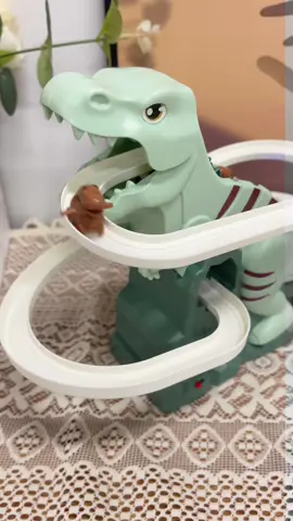 This dinosaur-shaped electric track slide toy deeply attracts children's attention#toy #dinosaurtoys #cartoy #tracktoy #cooltoy #tiktokshop #dealsforyoudays 