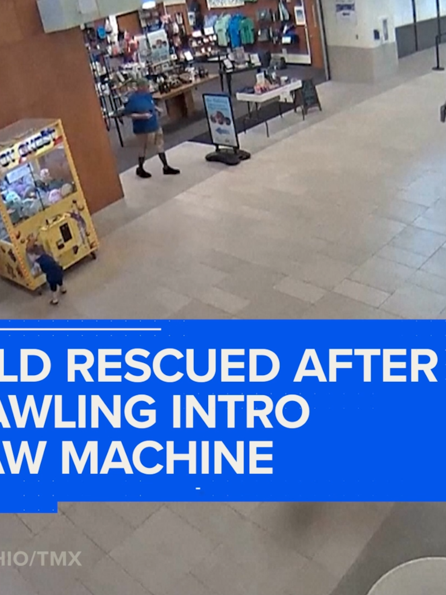 A child became trapped inside a stuffed animal-filled claw machine after trying to climb through the prize door.