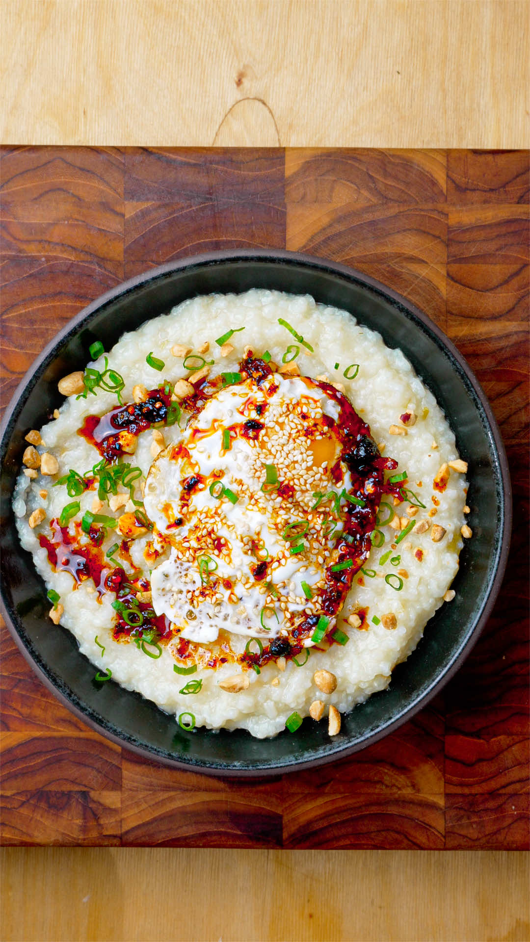 #ad Congee With Crispy Sesame Eggs This dish is hands down one of my favorites to whip together when I want something elevated but still approachable and nutritious for dinner. The crispy sesame @IncredibleEgg is the real star of my show and is a fun way to try something different with your eggs. The recipe below yields 4 portions, cheers!  Ingredients 1 cup rice 7 cups water or stock 4 scallions, minced with whites & greens separated 1 inch piece of ginger, sliced 4 large eggs 1-2 tbsp neutral oil 1 tbsp sesame seeds Garnishes of your choice (I used the scallion greens, some peanuts, and a little chili oil)  Instructions Add the rice, water/stock, scallion whites, and ginger to a large pot. Set over medium heat and cook for about 45 minutes, stirring occasionally until most of the liquid has been absorbed and you achieve a porridge-like consistency.  Preheat a large nonstick pan over medium-high heat, then add enough neutral oil to cover the bottom completely and add your eggs.  Allow the eggs to cook about halfway through, then sprinkle on the sesame seeds while they finish cooking.  Split the congee between 4 bowls, then top each bowl with a crispy sesame egg and your garnishes of choice. The Incredible Egg #CartonCreativity https://ooh.li/61159a4 Create your own eggtastic recipes https://www.tiktok.com/@officialincredibleegg