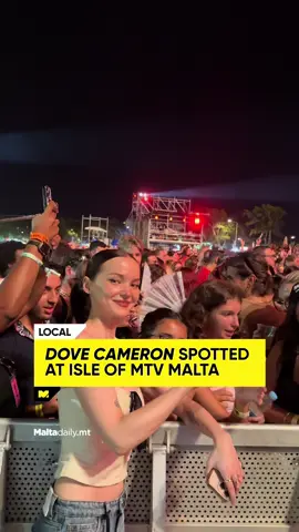 Actress and singer Dove Cameron was spotted in the crowd at the 17th edition of Isle of MTV Malta, cheering on her boyfriend Damiano David during his solo set. Her surprise appearance caused a stir, with fans rushing over for selfies and a quick hello. Dove first rose to fame on Disney Channel’s Liv and Maddie, playing twin sisters in a role that earned her a Daytime Emmy. She also starred as Mal in the Descendants films. In music, she dropped her debut EP Alchemical: Volume 1 in late 2023, which included the double-platinum single Boyfriend. In 2025, she joined Dua Lipa’s Radical Optimism Tour across the UK and Ireland and released new tracks like Too Much and French Girls. Dove and Damiano confirmed their relationship in early 2024 after months of rumours. Dove said she was nervous about going public but found comfort in Damiano’s down-to-earth approach. The two first met at the VMAs in 2022 but only reconnected a year later, when the timing was right. Damiano, best known as Måneskin’s frontman, was one of the night’s headline acts. His solo performance at Floriana’s Fosos featured tracks from his debut album Funny Little Fears, including Born With a Broken Heart, Next Summer and Zombie Lady. He performed between Ella Henderson and Alok, bringing raw emotion and energy to the stage. #MaltaDaily  
