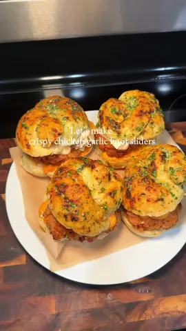 Let’s make crispy chicken garlic knots sliders 🍔  Recipe  **For chicken  2 chicken breast divided into 6 2 Teaspoon paprika powder  2 Teaspoon chicken bouillon  2 Teaspoon garlic powder  1 Teaspoon cumin powder  1/2 Teaspoon salt  Hot sauce  1 Cup buttermilk  **For chicken batter  2 Cups all purpose flour  1/4 cup cornstarch  1 Teaspoon salt  1 Teaspoon cumin powder  1 Teaspoon black pepper  2 Teaspoons paprika powder  2 Teaspoons garlic powder  #chicken #sliders #crispy #garlic #fyp #crispychicken #garlicknots #EasyRecipes #recipes #dinner 