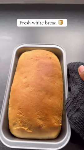 Fresh out of the oven — soft, fluffy white bread made from scratch 🥖✨ Creamy, golden, and better than store-bought!   🍞 White Bread (2 Loaves) –Ingredients: 	•	1 cup (250 ml) milk 	•	⅔ cup (120 g) whipping cream 	•	2 eggs 	•	¼ cup (50 g) sugar 	•	1 tbsp instant yeast 	•	5 cups (630 g) bread flour (or all-purpose flour) 	•	½ tsp salt 	•	60 g (5 tbsp) butter, softened  	👩‍🍳 White Bread Instructions (2 Loaves): 	1.	Activate the Yeast: 	•	In a large bowl, combine warm milk, sugar, and yeast. 	•	Stir and let sit for 10 minutes, until frothy. 	2.	Mix the Dough: 	•	Add the flour, a pinch of nutmeg (optional but adds warmth), salt, and softened butter. 	•	Mix until the dough is well combined and comes together. 	3.	Knead the Dough: 	•	Lightly flour your working surface. 	•	Knead the dough for about 30 minutes, until it becomes smooth, stretchy, and elastic. 	4.	First Rise: 	•	Place the dough in a lightly oiled bowl. 	•	Cover and let it rise in a warm place for 1 hour, or until doubled in size. 	5.	Punch & Second Knead: 	•	Punch down the dough to release air. 	•	Knead again for 10 minutes. 	6.	Shape & Second Rise: 	•	Shape the dough into loaves and place them into greased baking pans. 	•	Let rise for another 1 hour. 	7.	Bake: 	•	Preheat your oven to 325°F (163°C). 	•	Bake the bread for 15–20 minutes, or until the top is golden brown and crunchy. 	8.	Cool & Enjoy: 	•	Let the bread cool slightly before slicing. #homem#homemadebreade#whitebreadd#breadtokn#bakingfromscratchkin#bakingtiktokad#breadrecipe#bread#breadloverb#cozybakesodt#foodtoko#foryou#bakinglove #asmrb#asmrbakingd#kneadthatdoughker#bakersoftiktoksh#freshbakesafg#loafgoalsngtherapy